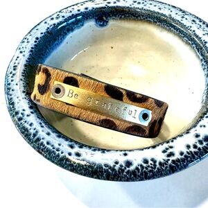 Leopard Print Leather Bracelet with 'Be Grateful' Engraving